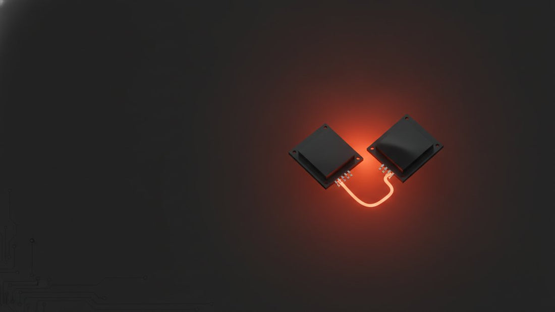 Two circuit boards connected by a single glowing ground wire