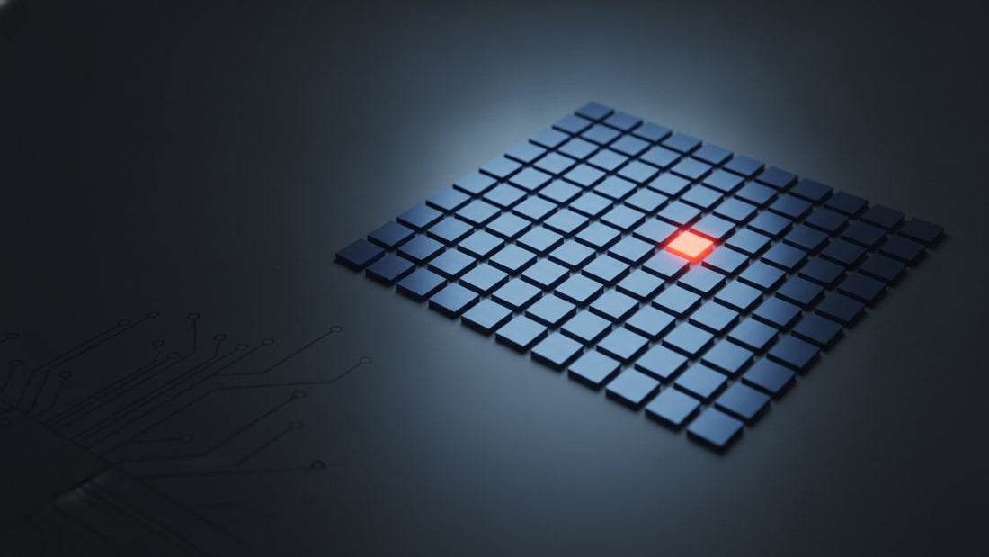 Grid of small sensor modules, one glowing, on dark background